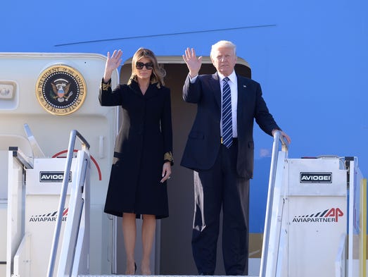The president and first lady step off Air Force One