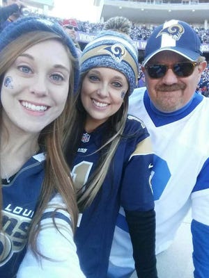 Busch and his daughters drove 10 hours to see the Rams play at Minnesota on Nov. 8.