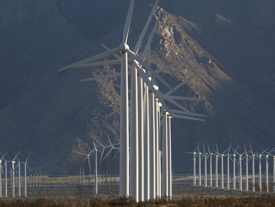 Wind turbines generate electricity near Whitewater, Calif., just outside Palm Springs, on Oct. 6, 2016.