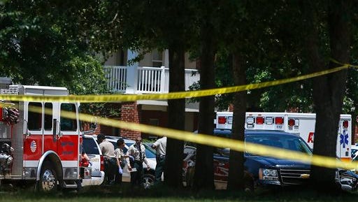 Shelby County Sheriffs deputies work the scene where four young children were fatally stabbed at the Greens of Irene apartment, Friday in Memphis.  Four young children were stabbed to death in a gated apartment complex in suburban Memphis on Friday, and police took their mother into custody for questioning.