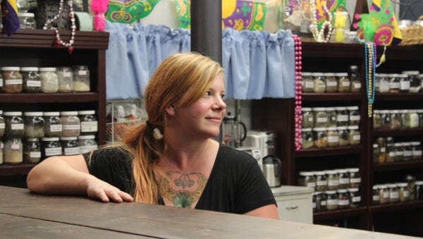 Meleah McCammon oversees Curiosities, including a selection of herbs and other curious goods.