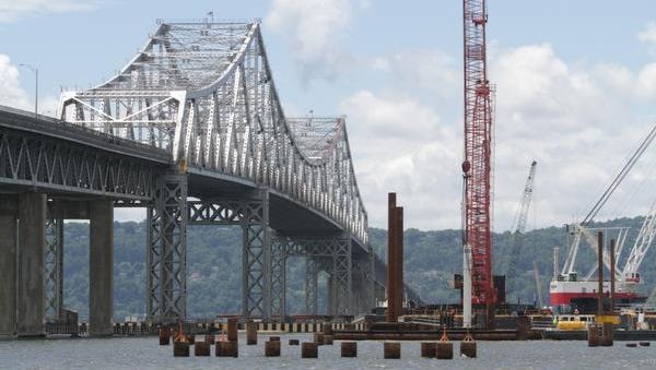 Pilings in the foreground have been driven to their full depth and are at their completed height, as viewed from a boat near the construction site of the Tappan Zee Bridge project, photographed June 5, 2014. The new span will be directly supported from these pilings.