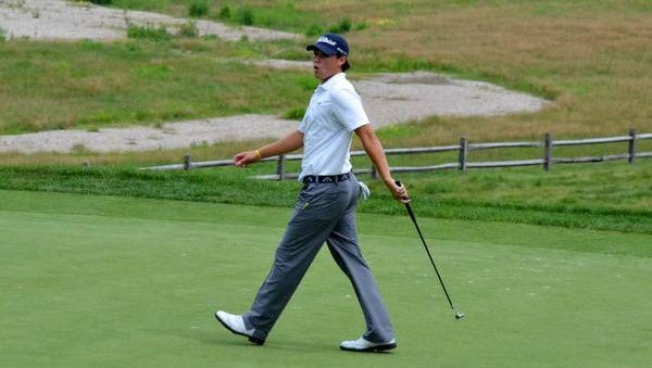 Mike Miller reacts to a long birdie putt that skirted the 15th hole Thursday at Bethpage State ParkÕs Black Course. The 22-year-old Brewster resident closed the New York State Open with a 65 and secured his first professional victory with a 7-under total.