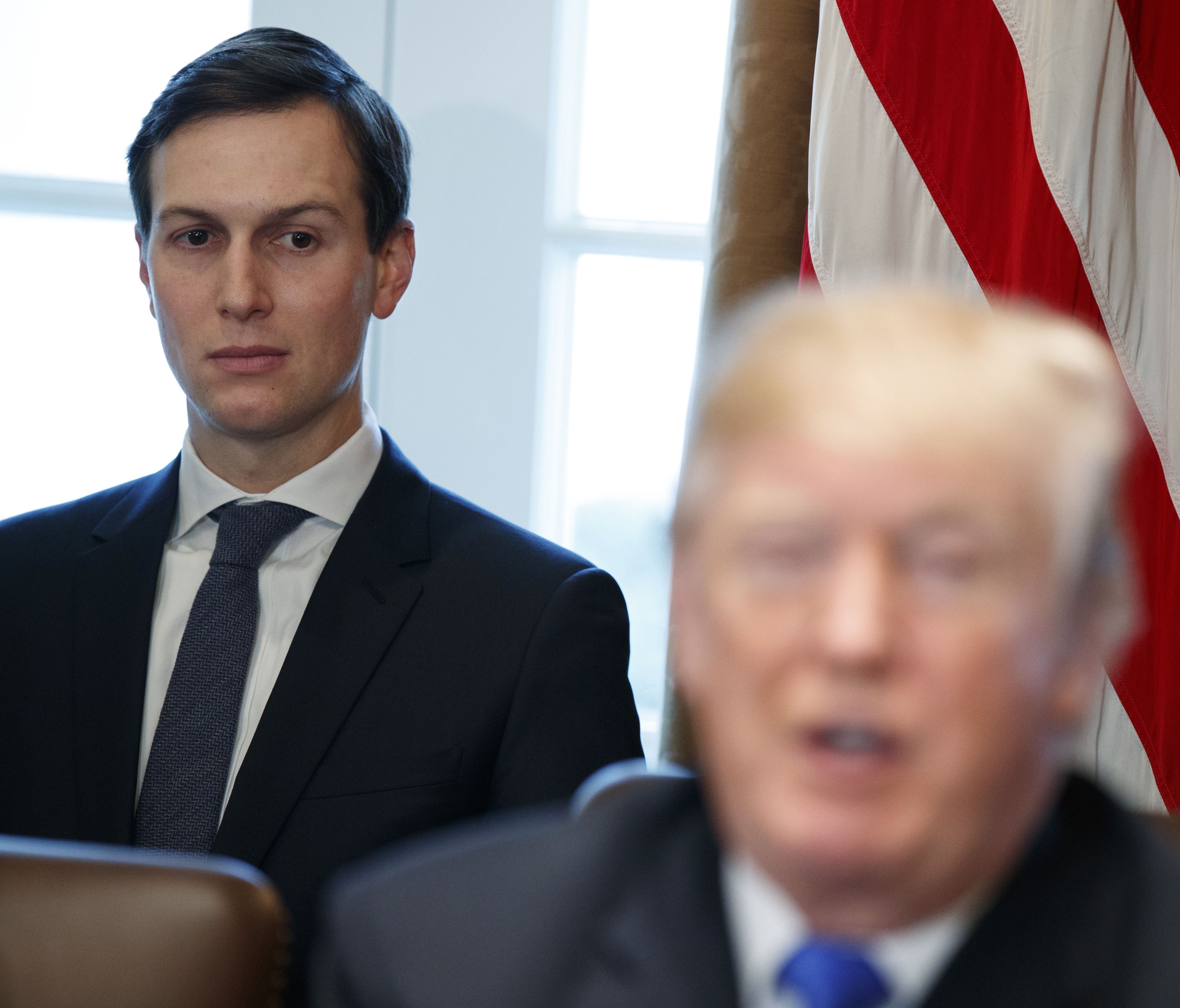 In as Dec. 20, 2017 file photo, White House senior adviser Jared Kushner listens as President Trump speaks during a cabinet meeting at the White House in Washington.