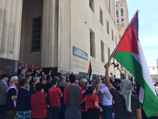 Supporters of Rasmieh Odeh, of Chicago, rally in Detroit