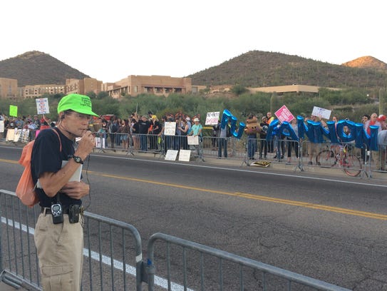 Protesters lined the road toward the J.W. Marriott