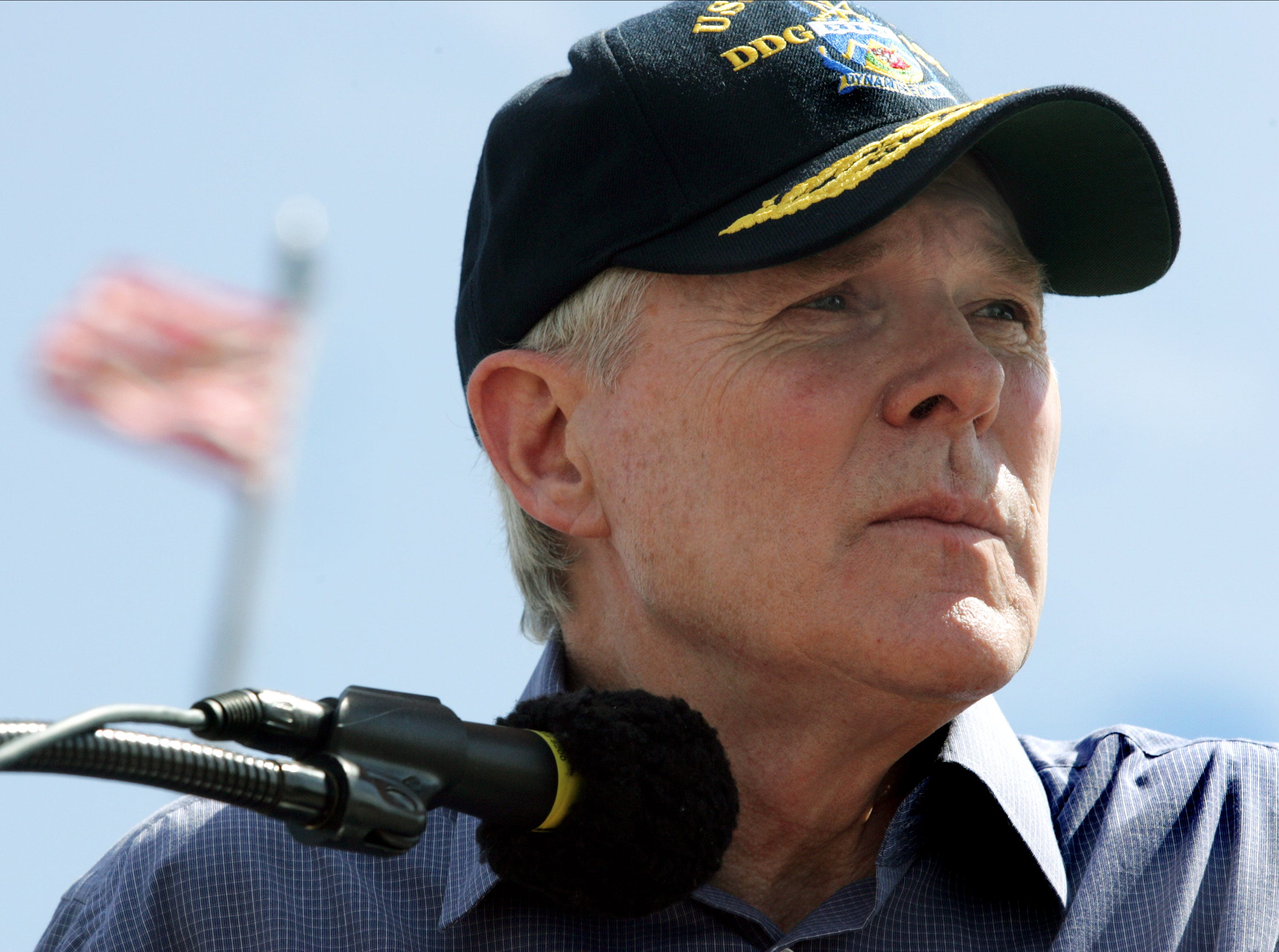 Secretary of the Navy After game, rivals work side by side