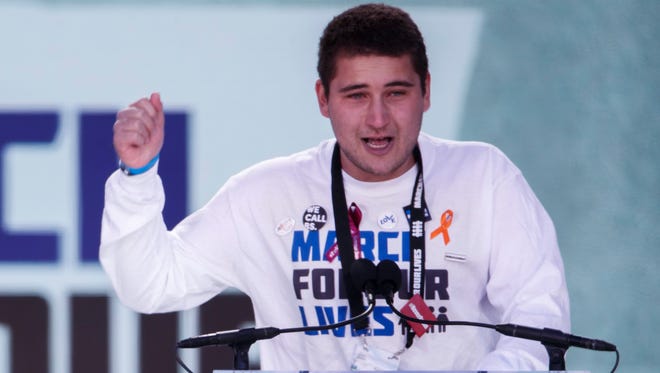 Alex Wind, a survivor of the school shooting at Marjory Stoneman Douglas High School speaks at during the March For Our Lives in Washington on March 24, 2018. March For Our Lives student activists demand that their lives and safety become a priority, and an end to gun violence and mass shootings in our schools.