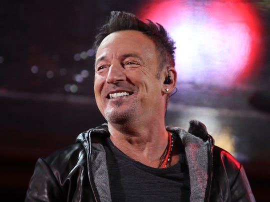Bruce Springsteen performs with U2 in Times Square