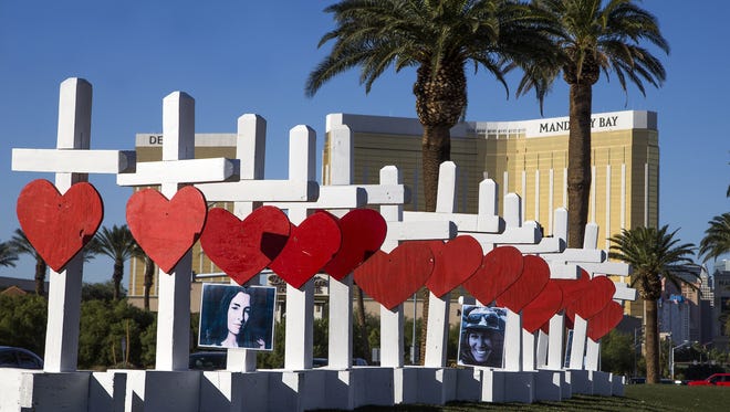 Artist Greg Zanis of Aurora, Ill., constructed 58 crosses and drove across the country to install them on Las Vegas Blvd to honor the people killed in the Las Vegas mass shooting.