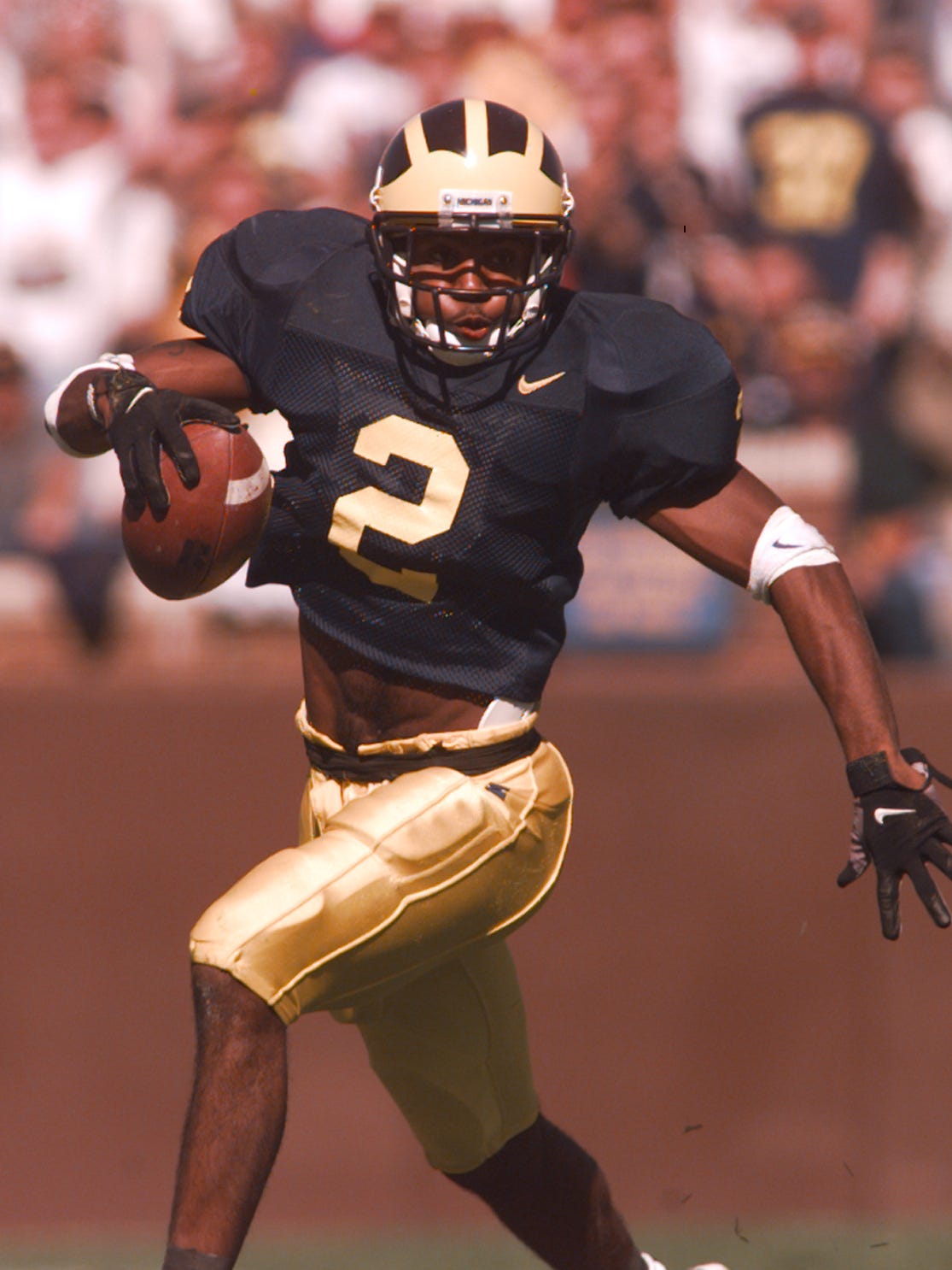 Michigan athletic director open to retiring Charles Woodson's No. 2