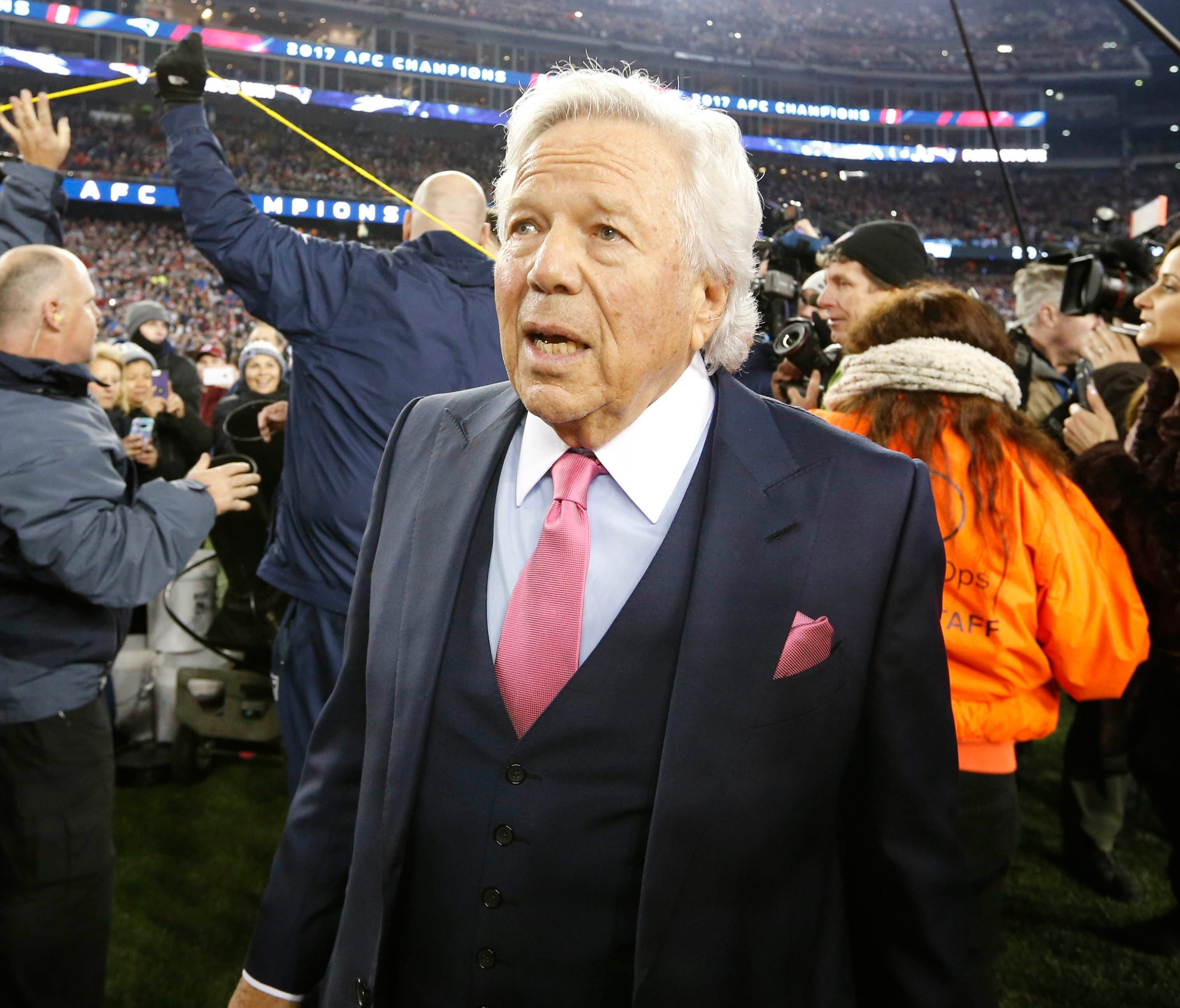 New England Patriots owner Robert Kraft walks off the field after the AFC Championship Game against the Jacksonville Jaguars  at Gillette Stadium.