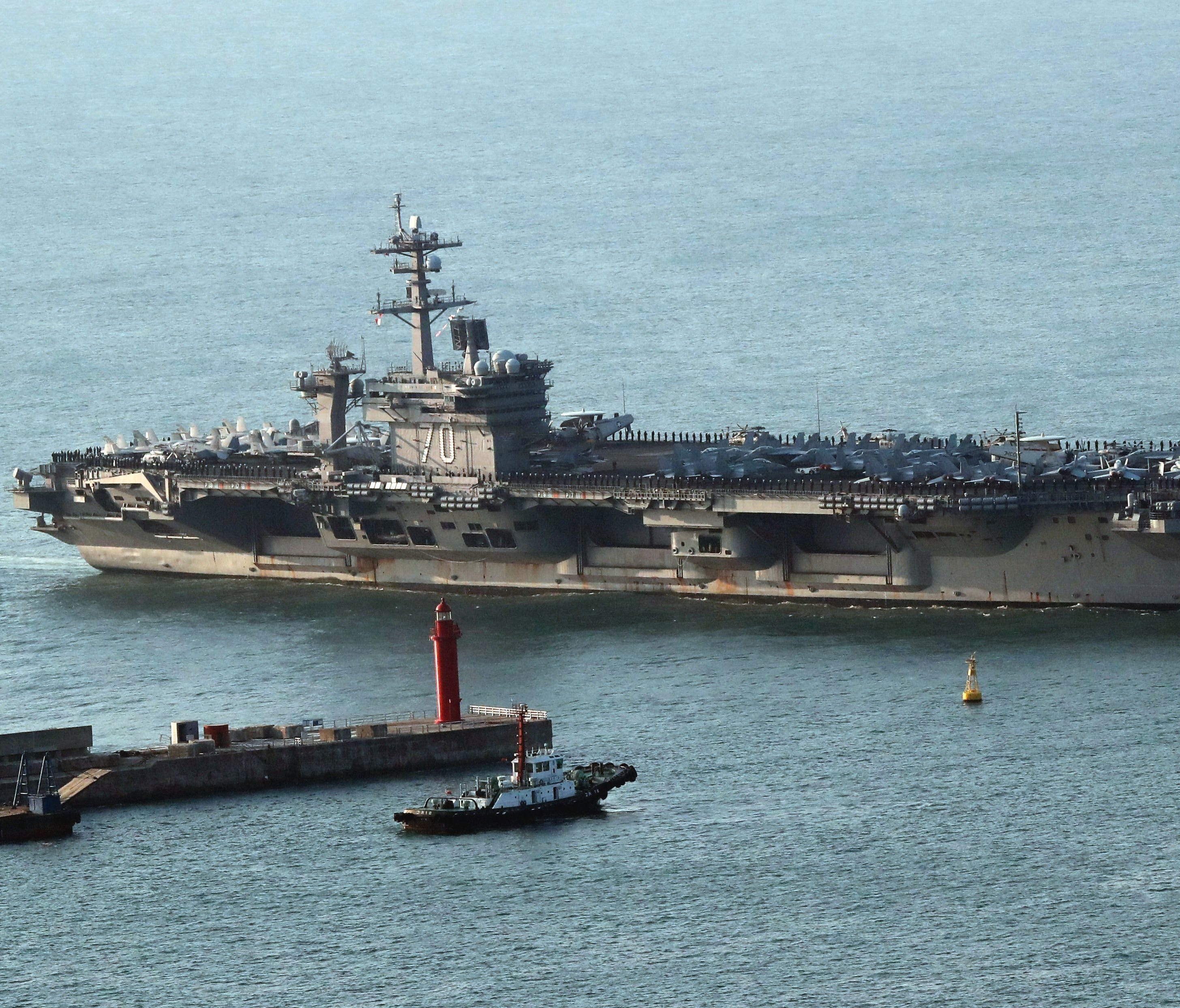 The USS Carl Vinson supercarrier arrives at a port in Busan, South Korea on March 15, 2017