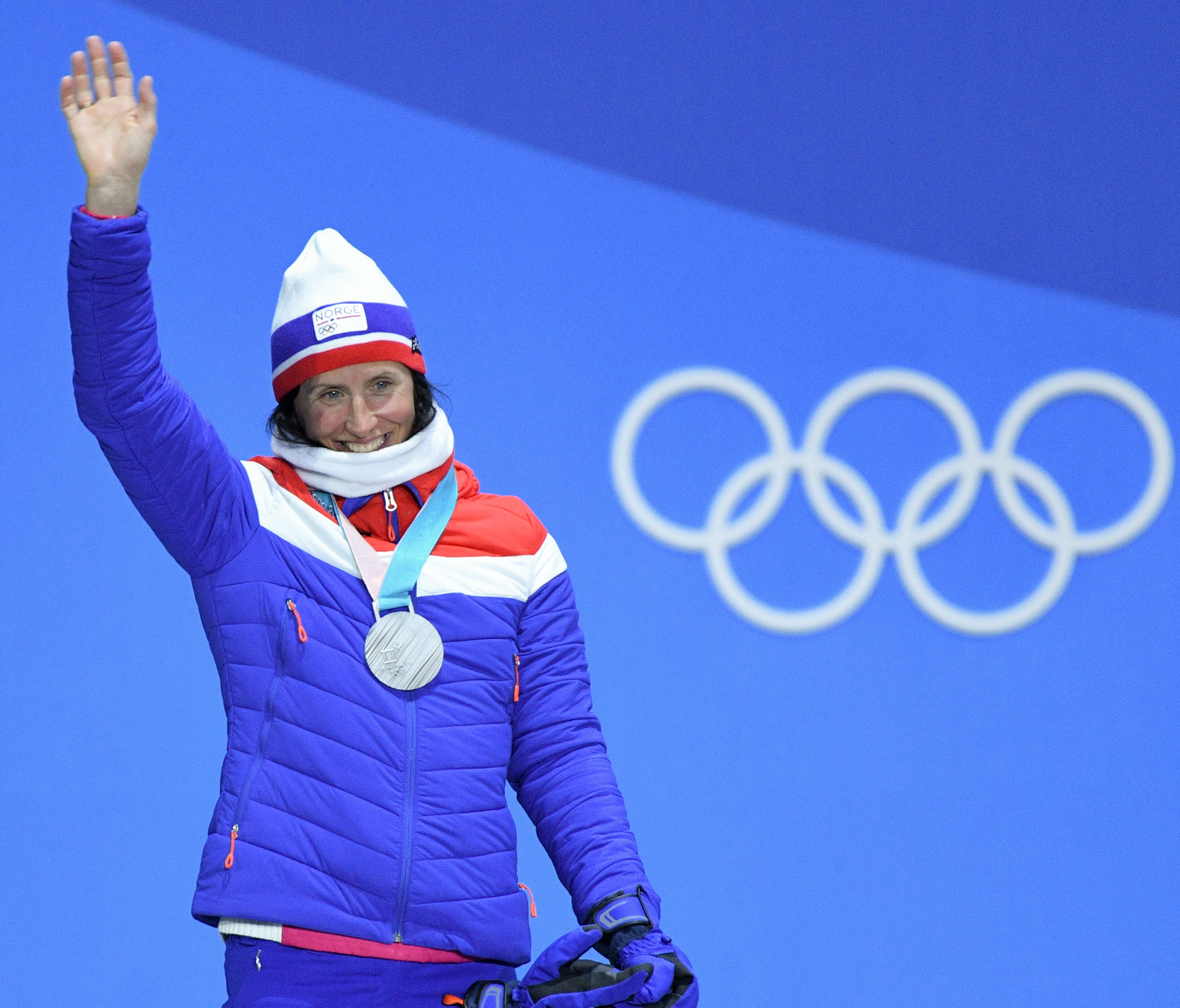 Marit Bjoergen (NOR) reacts after receiving the silver medal in skiathlon.