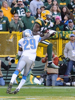 Crezdon Butler breaks up the pass from Aaron Rodgers to Davante Adams on the 2-point conversion try, preserving the Lions' 18-16 lead in the fourth quarter.