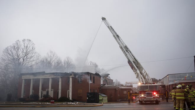 Crews work on the scene of a fire near Cherrydale that closed Poinsett Highway on Thursday, January 11, 2018.
