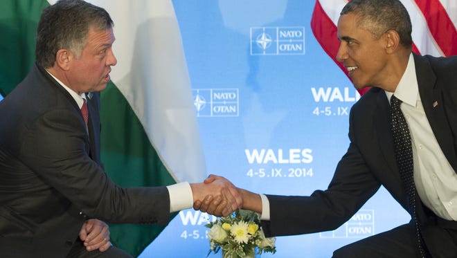 President Obama shakes hands with Jordan's King Abdullah II prior to a meeting on the first day of the NATO 2014 summit at the Celtic Manor Hotel in Newport, South Wales, on September 4, 2014.