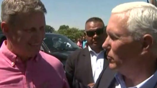 Congressman Bill Huizenga and Vice President Mike Pence chat about why Pence and his family came to Grandville for the Fourth of July Parade on July 4, 2017.