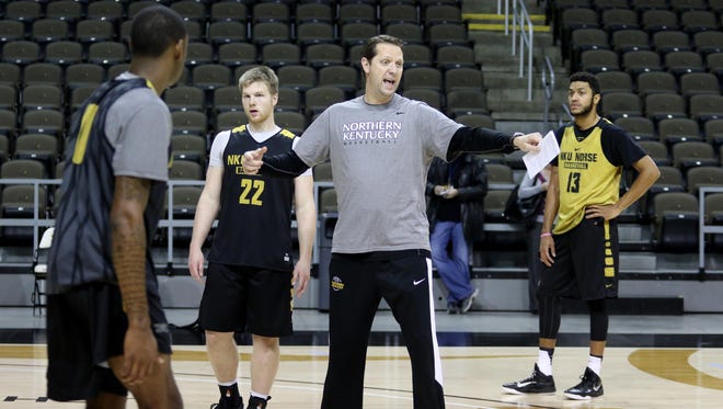 New Northern Kentucky University men’s head basketball coach John Brannen works with his team Tuesday at BB&T Arena.