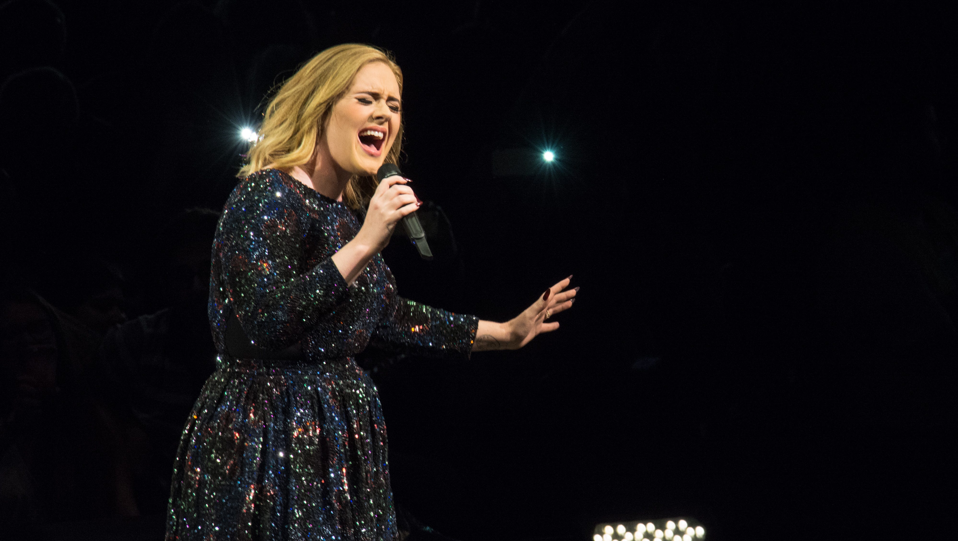 Adele Roasts A Fan For Filming Her Concert With A Tripod