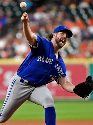 Toronto Blue Jays starting pitcher R.A. Dickey delivers  against the Houston Astros on  Aug. 2, 2016.
