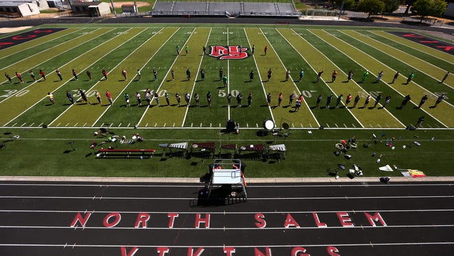 The marching band learns their steps during band camp at North Salem High School, Thursday, August 20, 2015, in Salem, Ore.