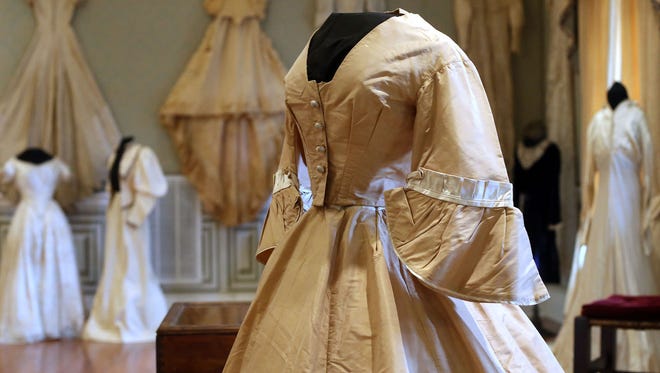 A vintage gown on display at the 2014 "Wedding Dresses Through the Decades." This marks the 10th anniversary of the display, which kicks off in 2021 on Jan. 16 and runs through March 27.