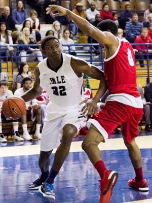 Justin Sears, left, leads Yale