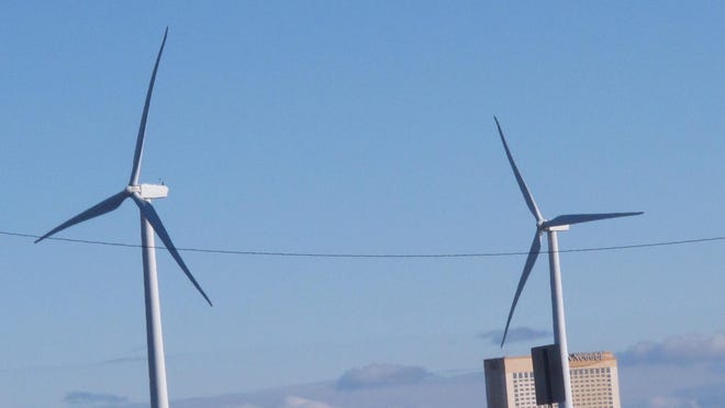 Windmills at a sewer plant in Atlantic City turn in the wind on Jan. 4, 2016. The Environment New Jersey environmental group issued a report Monday saying that New Jersey has the greatest potential to develop offshore wind energy of any mid-Atlantic or New England state.