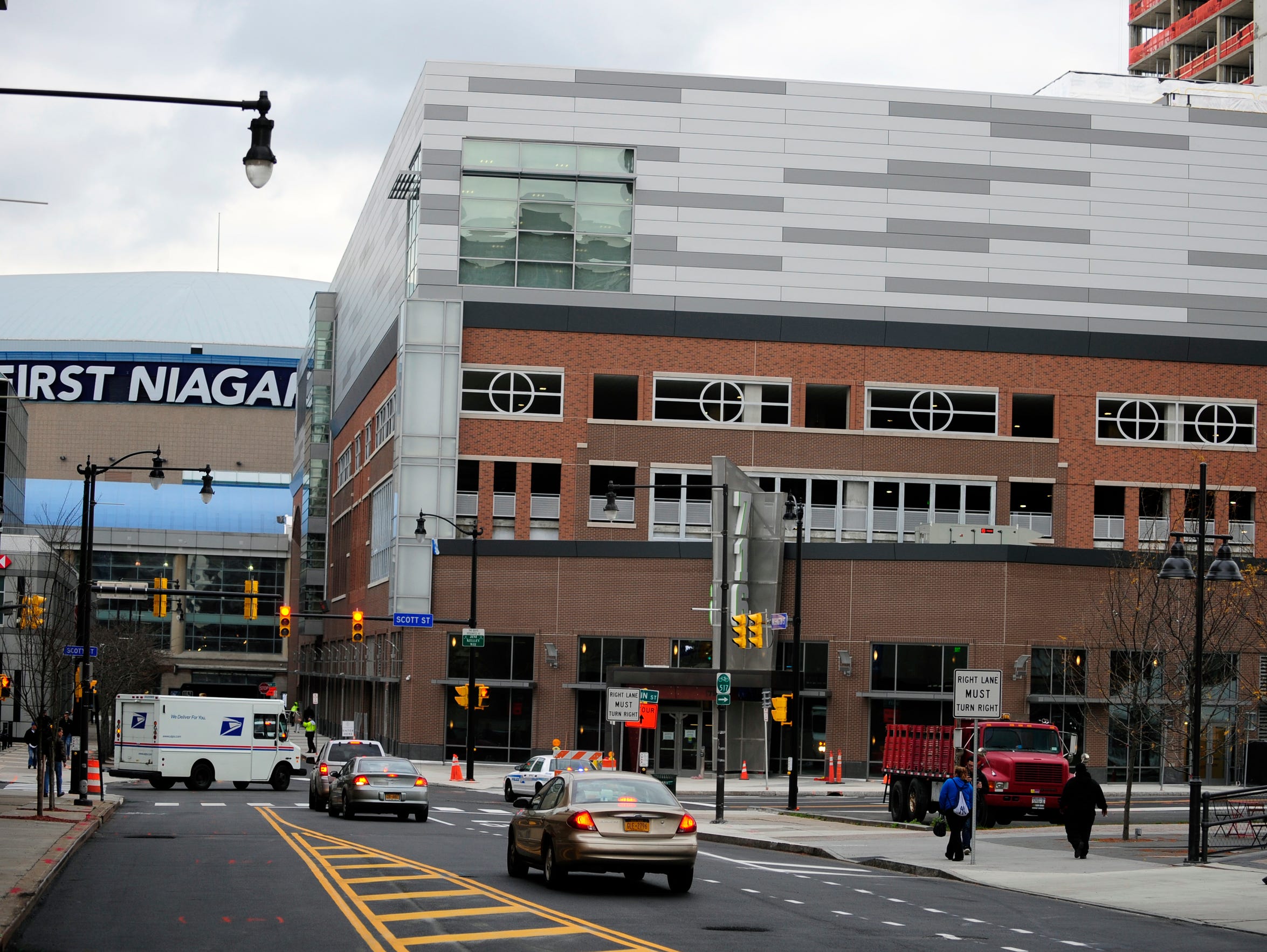 Traffic starts to flow in front of HarborCenter, which