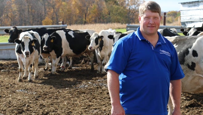 Wisconsin Farmers Union President Darin Von Ruden is pictured on his Vernon County dairy farm. WFU is asking legislators to ensure that the Trans-Pacific Partnership include binding provisions on currency manipulation to protect U.S. farmers. Nearly 80 percent of respondents in a survey of Wisconsin dairy farmers conducted by WFU this fall favored Congress rejecting or placing a moratorium on the TPP in its current form until concerns over imported Milk Protein Concentrates (MPCs) and other low-cost imports are resolved.