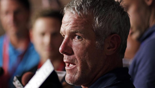 Pro Football Hall of Fame 2016 inductee Brett Favre talks to reporters Friday in Canton, Ohio.