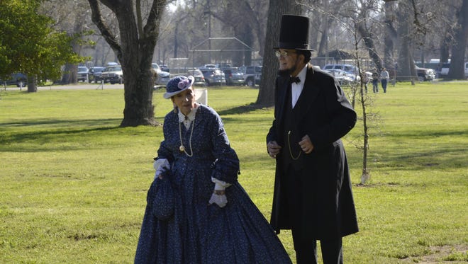 Wayne L. Scott, left, plays Abraham Lincoln during the Civil War reenactment at Mooney Grove on Saturday.
