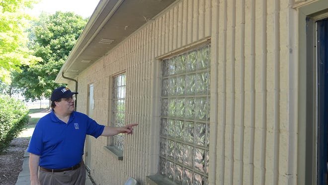 Novi City Councilman Dave Staudt checks out the aging administration building at the city’s Lakeshore Park in this file photo leading up to last fall's capital improvements millage.