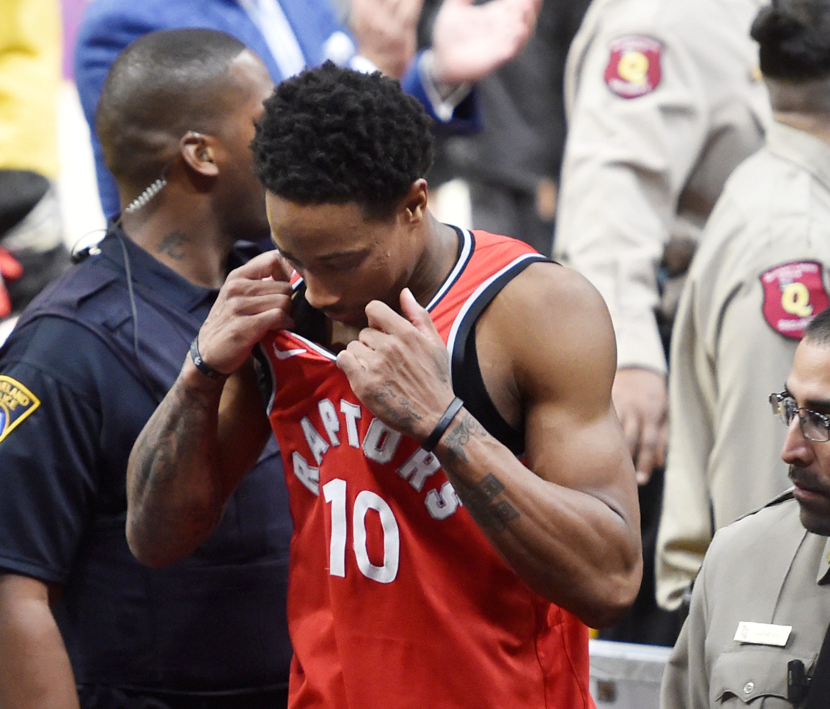 Toronto Raptors guard DeMar DeRozan (10) walks off the court after being ejected for a flagrant foul in the third quarter against the Cleveland Cavaliers in game four of the second round of the 2018 NBA Playoffs at Quicken Loans Arena.