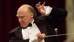 Conductor Edvard Tchivzhel leads the orchestra at a concert in the St. Petersburg Philharmonic in St. Petersburg, Russia, April 25, 2003.