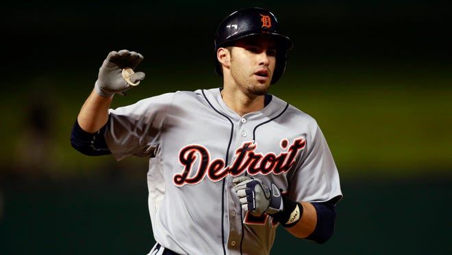 Detroit Tigers left fielder J.D. Martinez rounds the bases after hitting a home run against the Texas Rangers at Globe Life Park in Arlington.