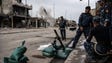 Iraqi federal police fire a mortar at an Islamic State
