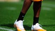 Wide receivers coach Kevin Beard sports new cleats