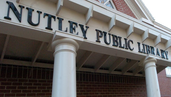 The Nutley Public Library is near Town Hall.