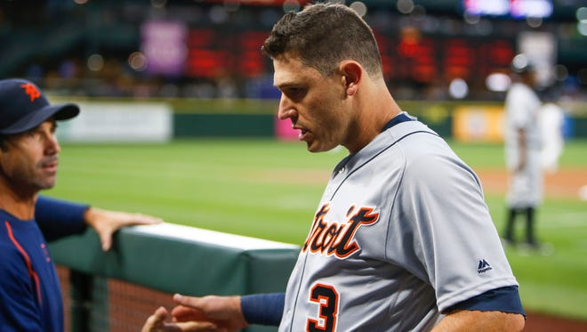 Tigers second baseman Ian Kinsler is greeted in the dugout after scoring a run during the fourth inning of the Tigers' 3-1 loss Wednesday in Seattle.