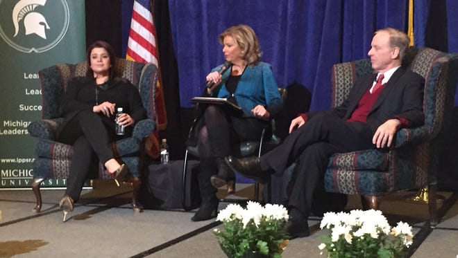 From left, Ana Navarro, Carol Cain and Howard Dean at the Michigan Political Leadership Program dinner in Livonia on March 2, 2017.
