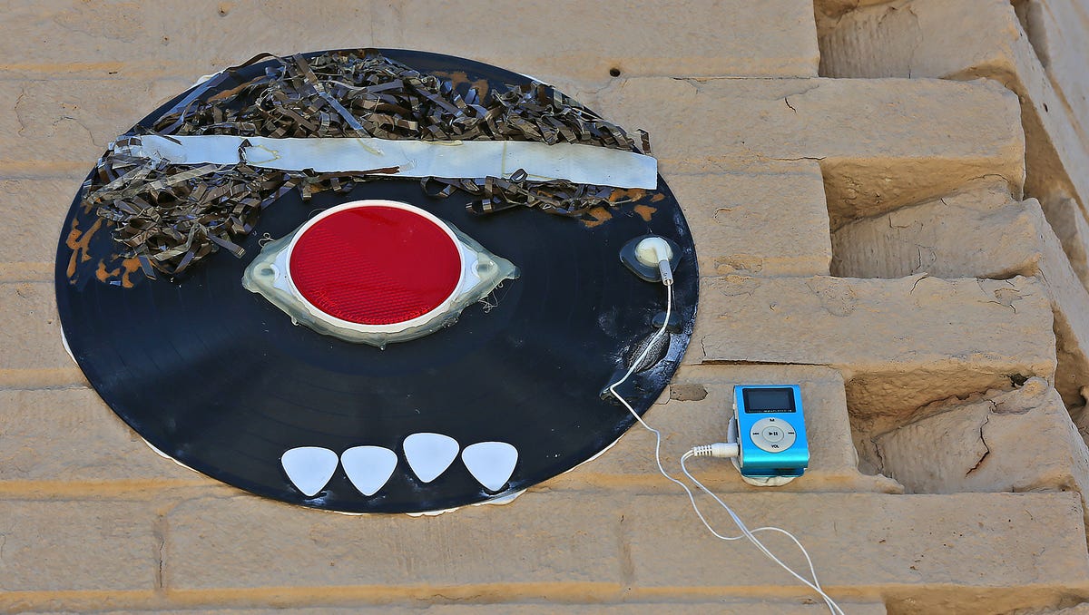 Indianapolis Recordface Street Art Installation Captivates Irritates