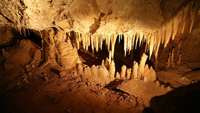 A bristling forest of stalactites, stalagmites, columns and crystals fill the soaring rooms.
