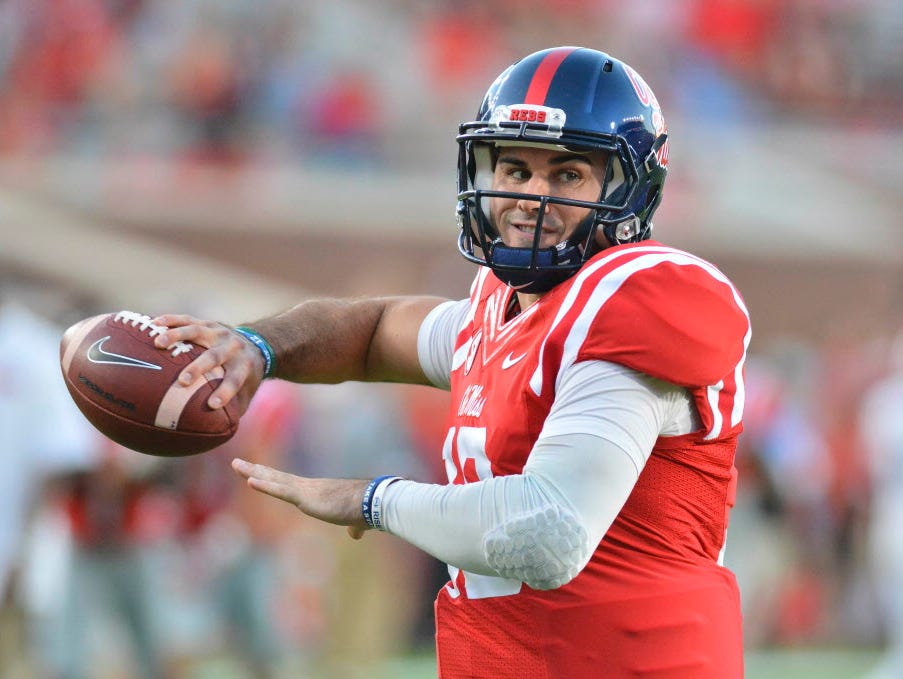 Mississippi Rebels quarterback Chad Kelly (10) warms up prior to the game against the Auburn Tigers at Vaught-Hemingway Stadium.