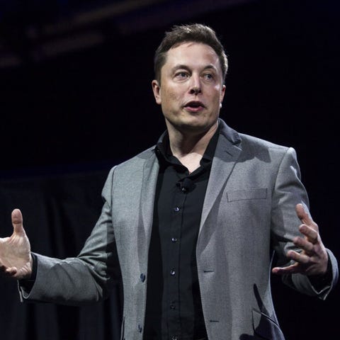 Elon Musk, CEO of Tesla Motors Inc., unveils the...
