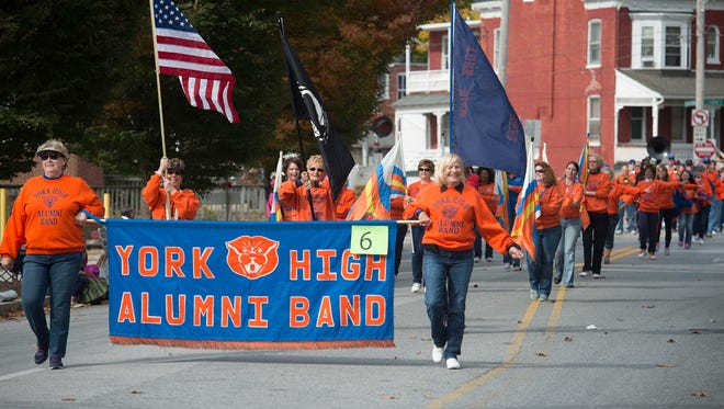 The York High Alumni band performed during the York Halloween Parade Sunday.