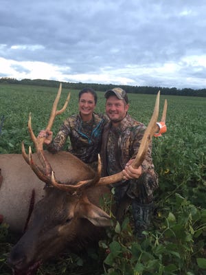 Emily Schaff, pictured with Cody Baker, took a bull elk during the 2016 Michigan elk hunt.