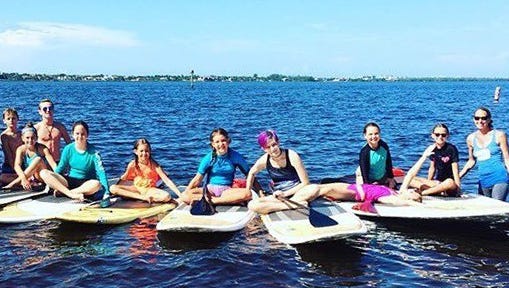 The city of Cape Coral offers various summer camps for children, including paddleboarding.