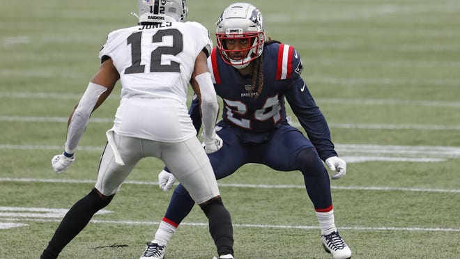 New England Patriots cornerback Stephon Gilmore covers Las Vegas Raiders wide receiver Zay Jones during a game at Gillette Stadium, Sunday, Sept. 27, in Foxborough.